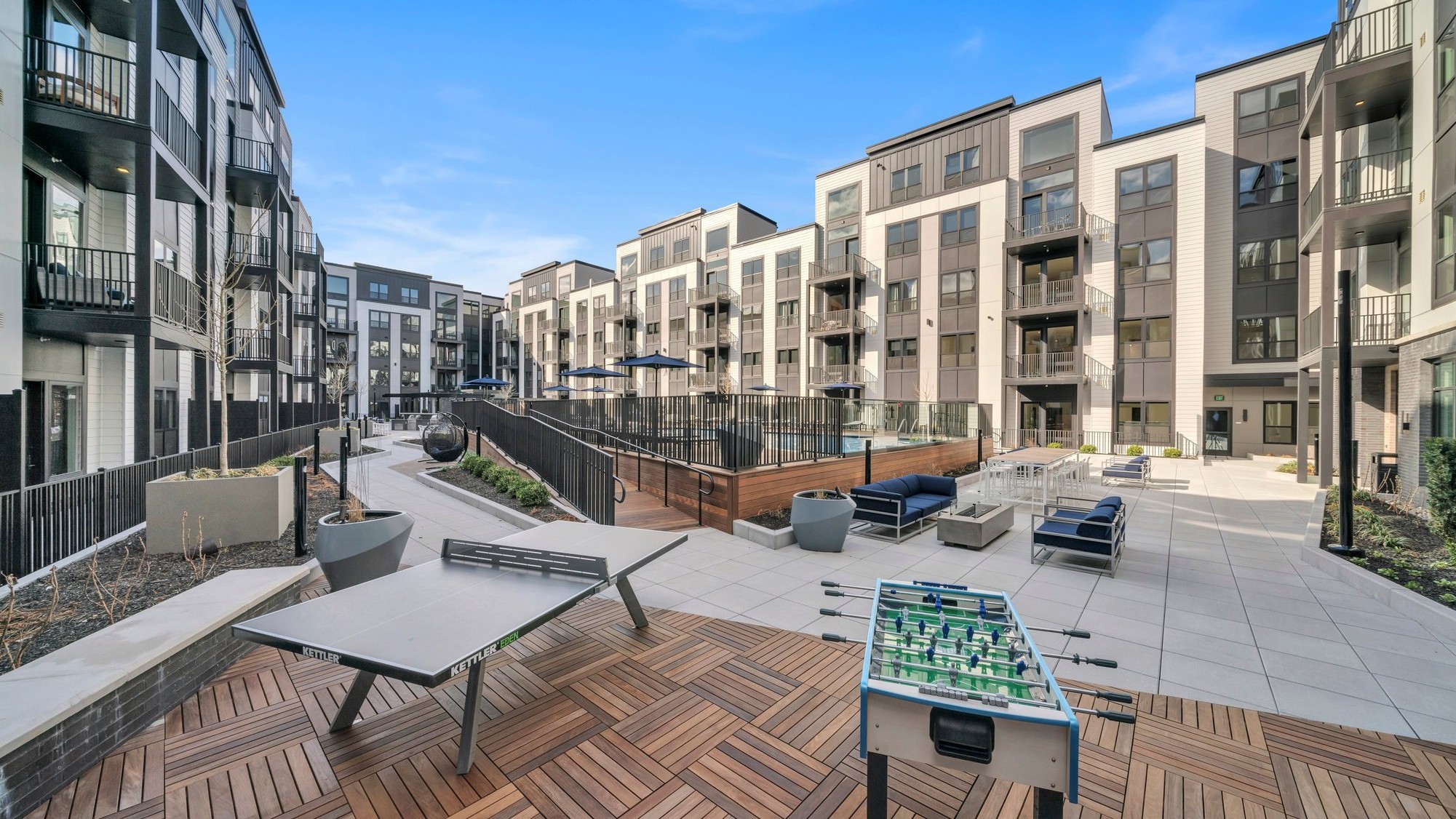 YOUNG NEW YORK CITY COUPLE TRADE IN URBAN HUSTLE AND BUSTLE FOR SUBURBAN SPACE AND PRIVACY AT THE MARQ TEANECK LUXURY RENTALS